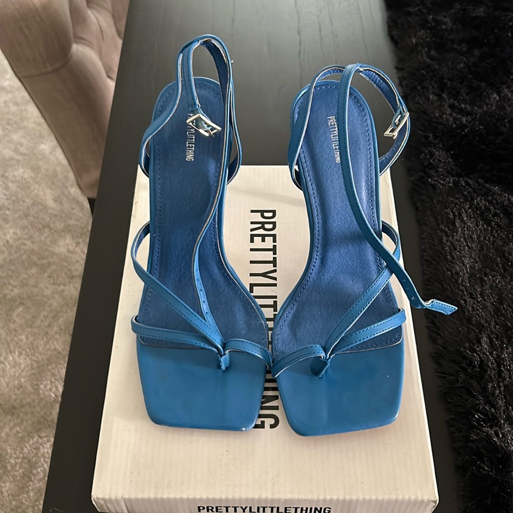 Worn once blue stappy high heeled sandals